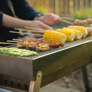 Elevate Your Outdoor Cooking with Our Folding Portable Charcoal Barbecue Grill Cooker